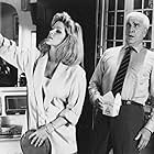 Leslie Nielsen and Priscilla Presley in The Naked Gun: From the Files of Police Squad! (1988)