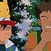 Ikue Ôtani, Eric Stuart, and Veronica Taylor in Gekijôban Poketto Monsutâ Kesshôtô no Teiô Entei (2000)