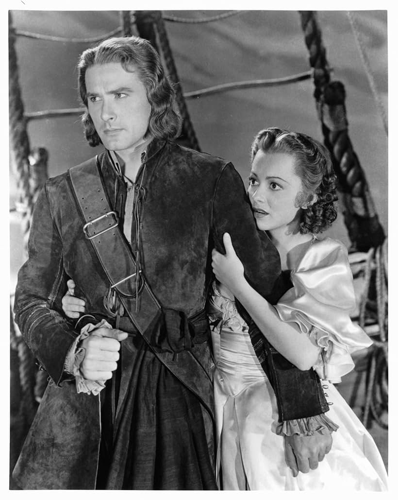 Olivia de Havilland and Errol Flynn in Captain Blood (1935)