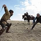 Tommy Lee Jones and Tim Blake Nelson in The Homesman (2014)