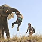 Ella Ballentine is lifted by an elephant in Against The Wild: Survive The Serengeti.  May 2015, South Africa.