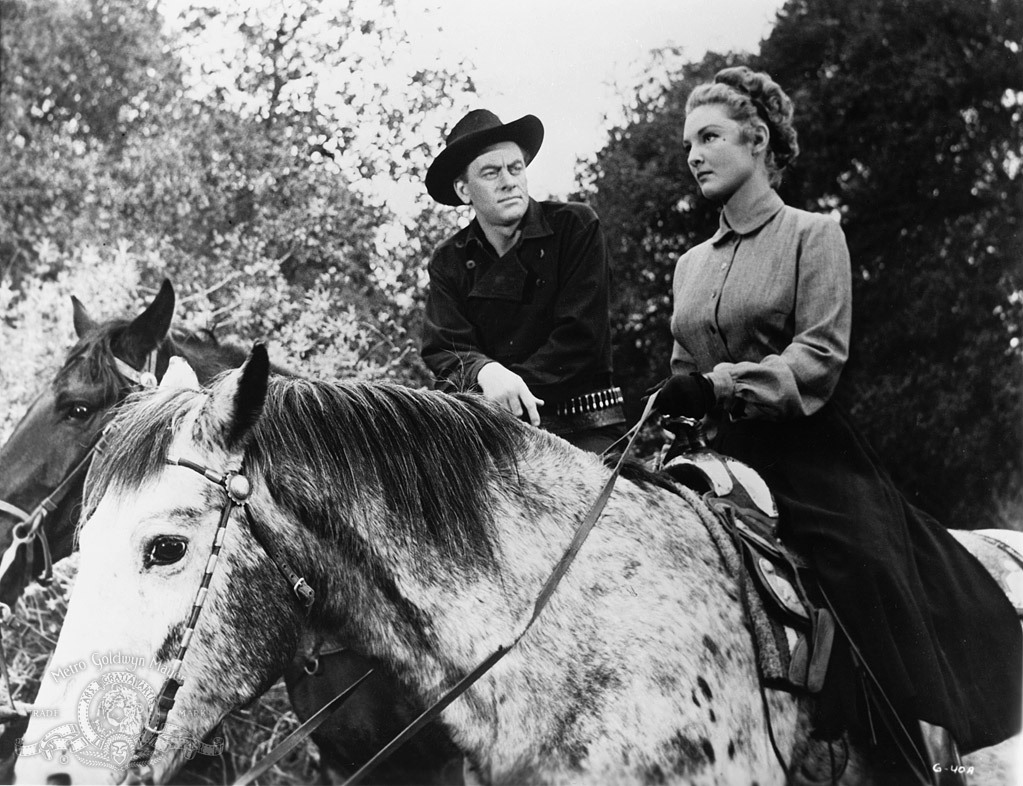 Allison Hayes and John Ireland in Gunslinger (1956)
