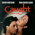 Maria Conchita Alonso and Arie Verveen in Caught (1996)