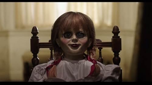 Several years after the tragic death of their little girl, a dollmaker and his wife welcome a nun and several girls from a shuttered orphanage into their home, soon becoming the target of the dollmaker's possessed creation, Annabelle.