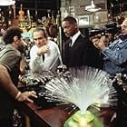 (L. to R.) Tony Shalhoub, Tommy Lee Jones, Will Smith and Director Barry Sonnenfeld on the set.