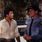 Christopher Mayer and Sonny Shroyer in The Dukes of Hazzard (1979)