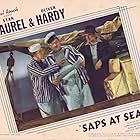 Oliver Hardy, Richard Cramer, and Stan Laurel in Saps at Sea (1940)