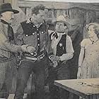 Yakima Canutt, Artie Ortego, Tex Phelps, and Alberta Vaughn in Randy Rides Alone (1934)