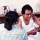 Dipankar Dey and Mamata Shankar in The Stranger (1991)
