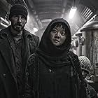 Chris Evans and Ko Ah-sung in Snowpiercer (2013)