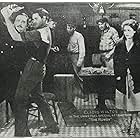 Rex De Rosselli, Jack Mower, Charles Murphy, Bert Roach, and Gladys Walton in The Rowdy (1921)