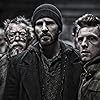 John Hurt, Jamie Bell, and Chris Evans in Snowpiercer (2013)