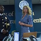 Claudia Black and David Gyasi in Containment (2016)