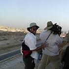 Producer Rick Ojeda, DP Evan Nesbitt and Director David Raynr carefully clutch to the side of the Great Pyramid of Egypt.