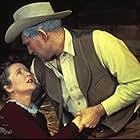 Margaret Campbell and Martin Kingsley in Gunslinger (1956)