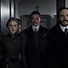 Daniel Brühl, Dakota Fanning, and Luke Evans in The Alienist (2018)