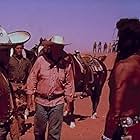 John Wayne, Jeffrey Hunter, Henry Brandon, and Antonio Moreno in The Searchers (1956)