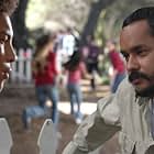 At The Kids' School, teachers (Vladimir Borges) have serious conversations with students (R-Jay Sharpe)