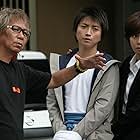 Tatsuya Fujiwara, Nanako Matsushima, and Takashi Miike in Shield of Straw (2013)