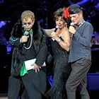 Sting, Elton John, and Shirley Bassey