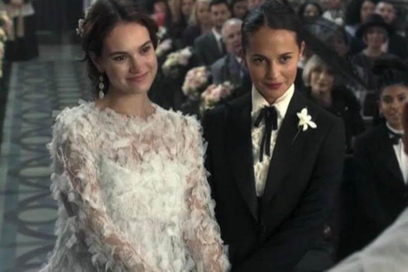 Alicia Vikander and Lily James in One Red Nose and a Wedding (2019)