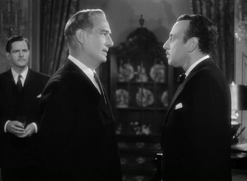 George Coulouris, Paul Lukas, and Donald Woods in Watch on the Rhine (1943)