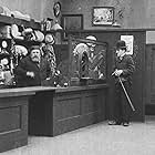 Charles Chaplin and Henry Bergman in The Pawnshop (1916)