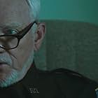 Malcolm McDowell in Silent Night (2012)