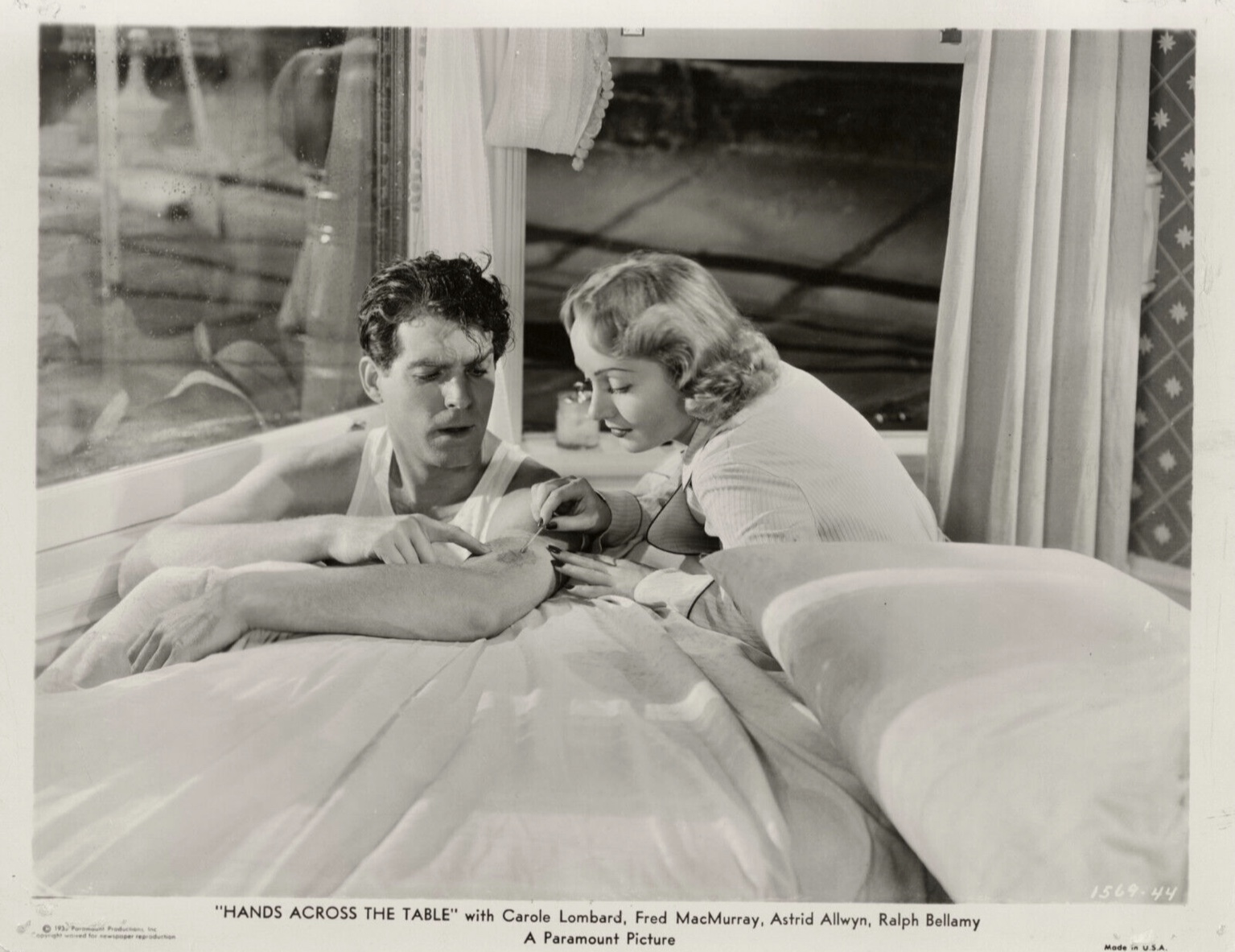 Carole Lombard and Fred MacMurray in Hands Across the Table (1935)