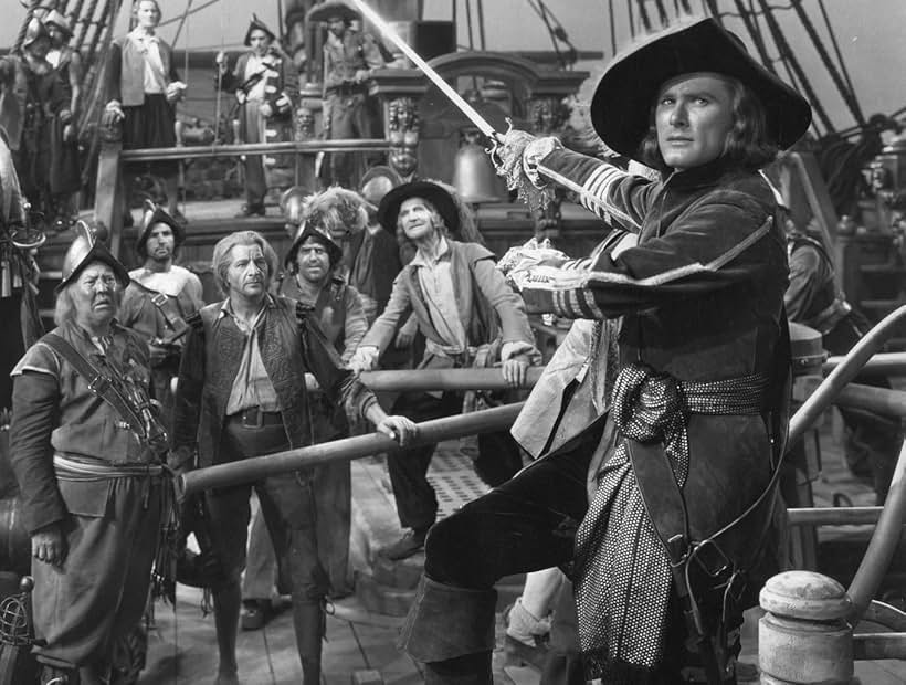 Errol Flynn and Guy Kibbee in Captain Blood (1935)