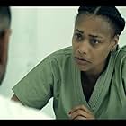 Tami Roman and Brandon Anthony in District (2018)
