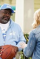 Cedric The Entertainer and Beth Behrs in Welcome to the Team (2020)