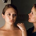 Sarah Paulson and Elizabeth Olsen in Martha Marcy May Marlene (2011)