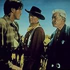 John Wayne, Ward Bond, and Jeffrey Hunter in The Searchers (1956)