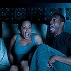 Marlon Wayans and Essence Atkins in A Haunted House (2013)