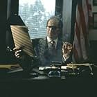 Gary oldman stars as Congressman Runyon
