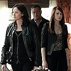 Laurence Fishburne, Melinda Clarke, and Jorja Fox in CSI: Crime Scene Investigation (2000)