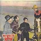 Gene Autry, George Chesebro, Ken Cooper, Frankie Marvin, and Champion in Red River Valley (1936)