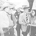 John Wayne, Ray Corrigan, George Douglas, Doreen McKay, and Max Terhune in Pals of the Saddle (1938)