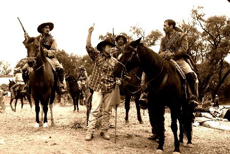 Korey Pollard, Second Assistant Director on "And starring Pancho Villa as Himself" directing Antonio Bandares in a battle sequence.