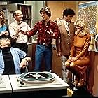 Loni Anderson, Tim Reid, Frank Bonner, Howard Hesseman, Richard Sanders, Gary Sandy, and Jan Smithers in WKRP in Cincinnati (1978)