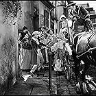 Lillian Gish, Renée Adorée, Mathilde Comont, Gino Corrado, Karl Dane, John Gilbert, and George Hassell in La Bohème (1926)