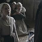 Kate Dickie, Ellie Grainger, and Anya Taylor-Joy in The Witch (2015)