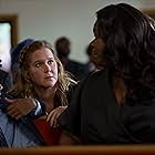 Amy Schumer and Yamaneika Saunders in Life & Beth (2022)