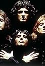 Roger Taylor, Brian May, Freddie Mercury, John Deacon, and Queen