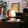 Carlease Burke, Neil Flynn, and Eden Sher in The Middle (2009)