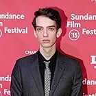 Kodi Smit-McPhee at an event for Slow West (2015)