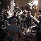 Thad Luckinbill, Michael Peña, Michael Shannon, Geoff Stults, Navid Negahban, Chris Hemsworth, Fahim Fazli, Austin Hébert, and Jack Kesy in 12 Strong (2018)