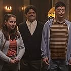 Beanie Feldstein, Harvey Guillén, and Hayden Szeto in What We Do in the Shadows (2019)