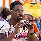 Damon Wayans Jr. in Barb and Star Go to Vista Del Mar (2021)